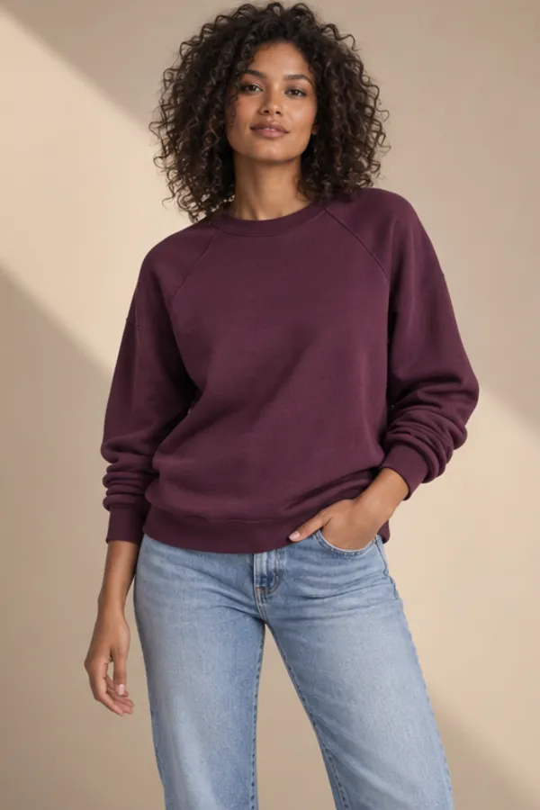 Adult model wearing a sweatshirt after an AI clothes change
